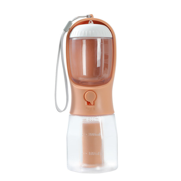 MATERA PET portable dog water bottle in copper orange with drinking trough and food chamber