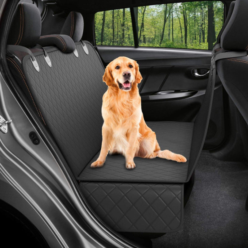 Golden Retriever sitting on the MATERA PET black car seat hammock in a back seat
