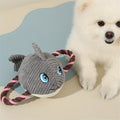 Puppy playing tug with the soft knot toy