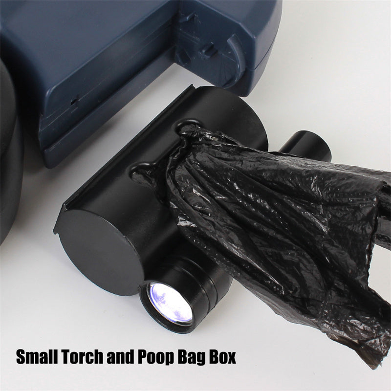 Close-up of the small torch and the poop bag box under the leash handle