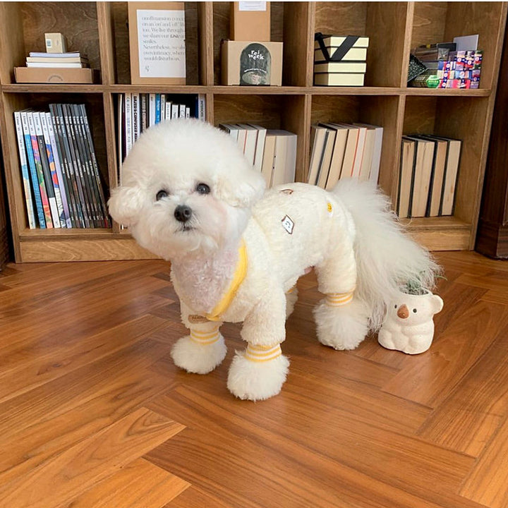 MATERA PET cream knit four-leg jumpsuit sweater worn by a small white dog
