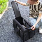 Foldable Pet Carrier Bag being used outdoors, showcasing its breathable design and foldable features for small dogs and cats.