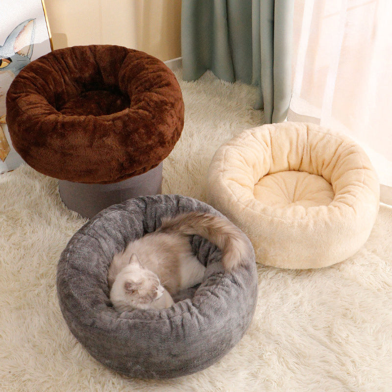 Grey round fluffy donut bed for dogs and cats