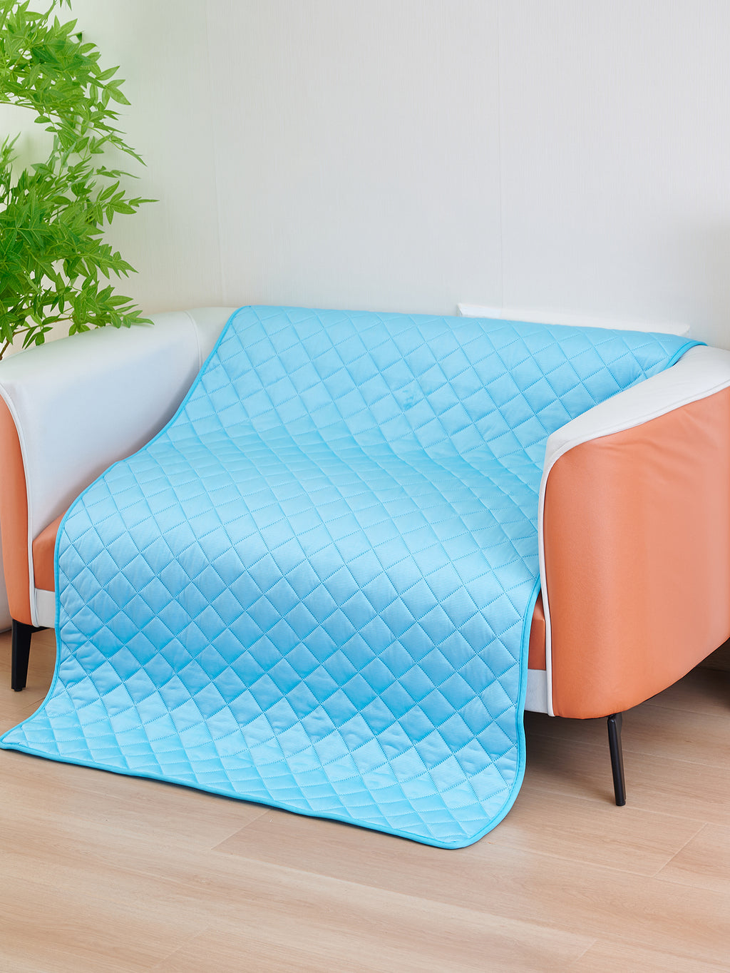 Blue waterproof cooling pad laid flat for a large dog