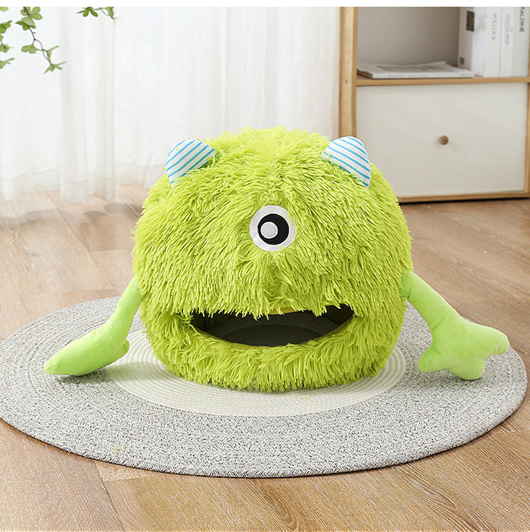 Cat curled up in the round plush cuddler