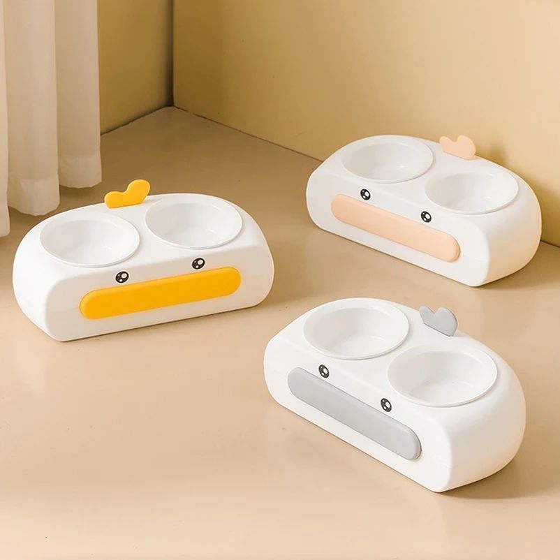 Double pet bowl with two stainless steel inserts