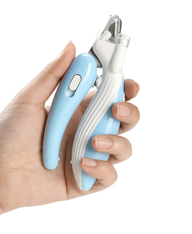 Hand gripping the non-slip handle of the blue LED pet nail clipper