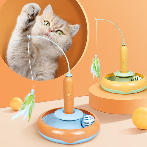 Cat batting at the feather wand of the MATERA PET turntable toy