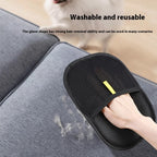 Washable MATERA PET grooming mitt wiping pet hair off a grey fabric sofa