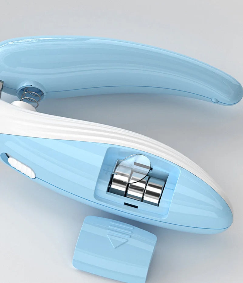 Blade and spare grinding heads stored inside the LED pet nail clipper