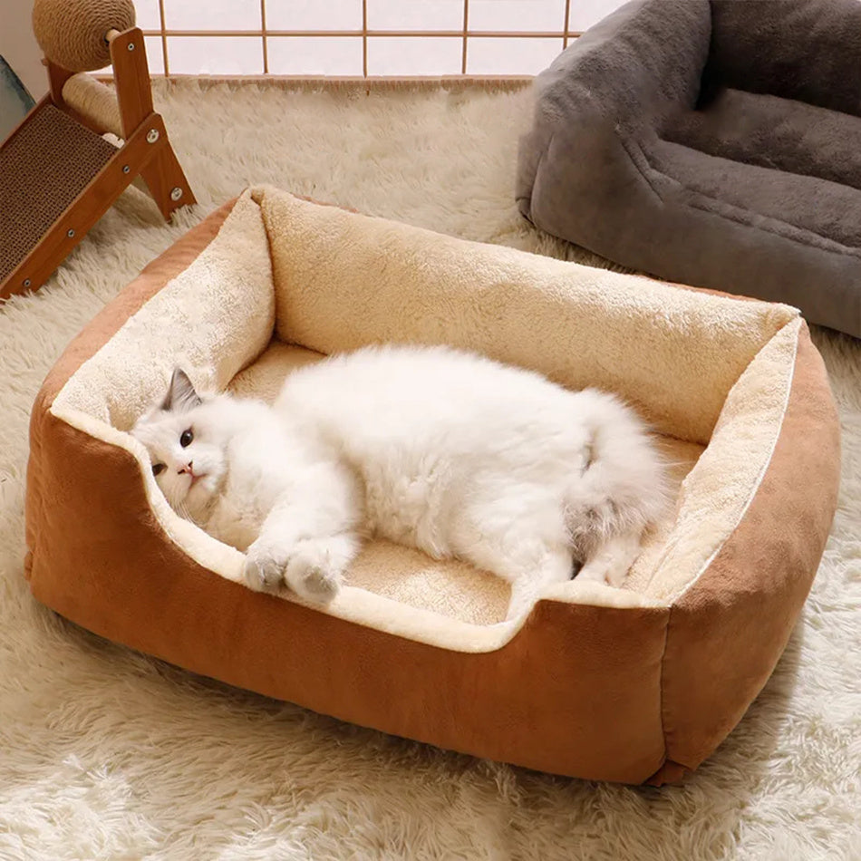 Green padded cushion bed placed inside a crate
