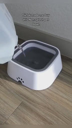 Dog and cat drinking from the MATERA PET no-spill floating water bowl without splashing the floor